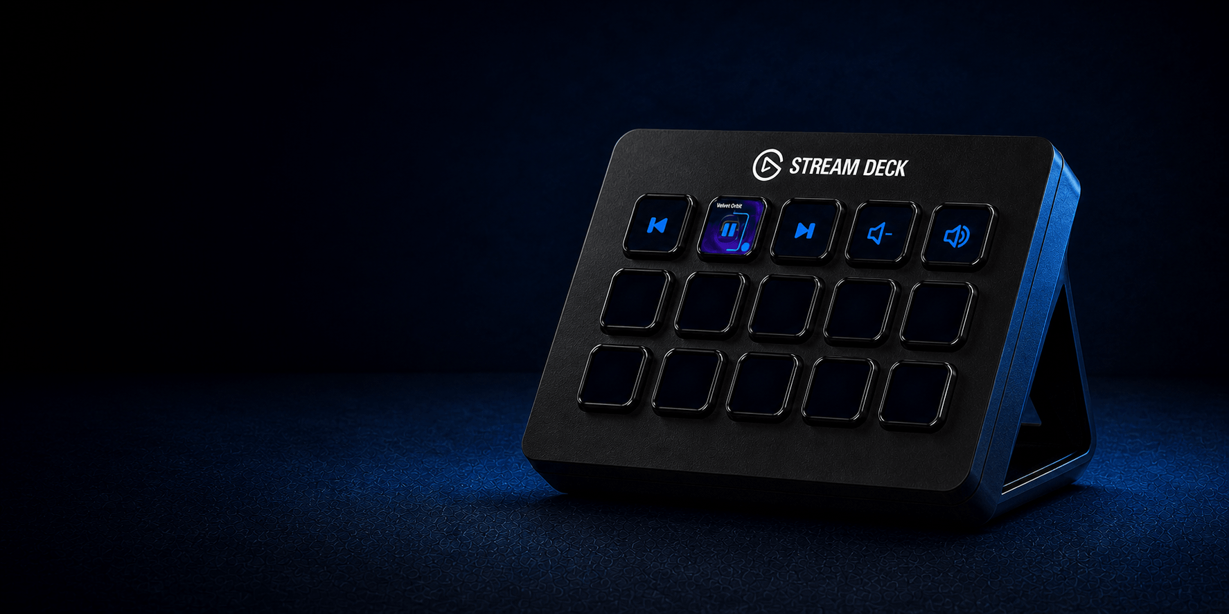 A regular 15-key Stream Deck facing left with Playback Windows controls and live track artwork